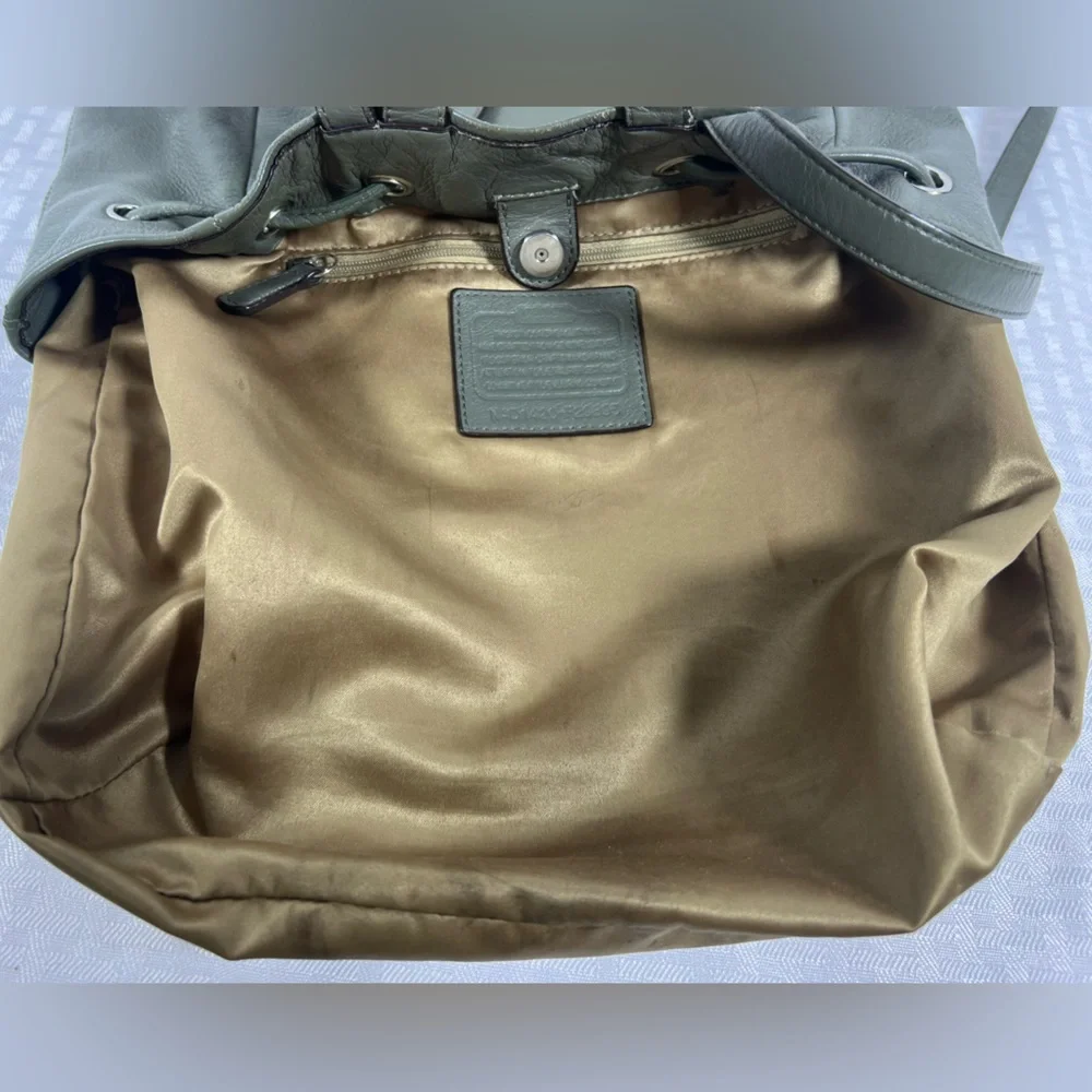 4019: Coach Olive Green Pebbled Leather Drawstring Backpack